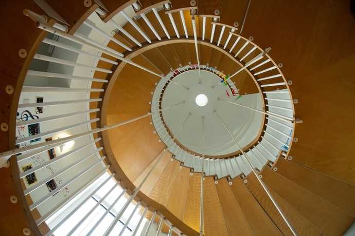 Camera looking down a spiral staircase